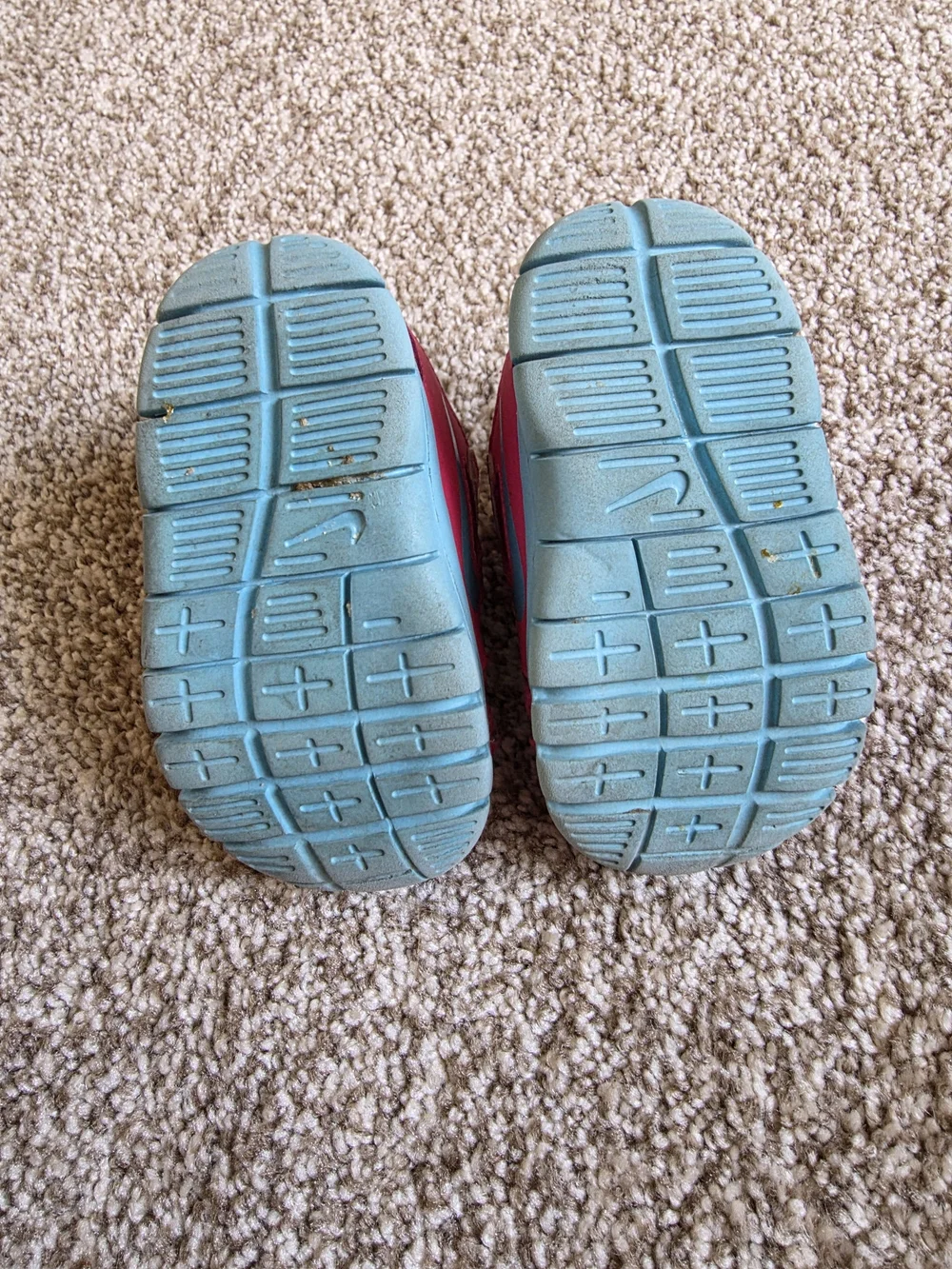 Nike Kids' Pink Athletic Sneakers with Teal Accents